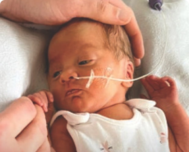 Newborn baby receiving medical care